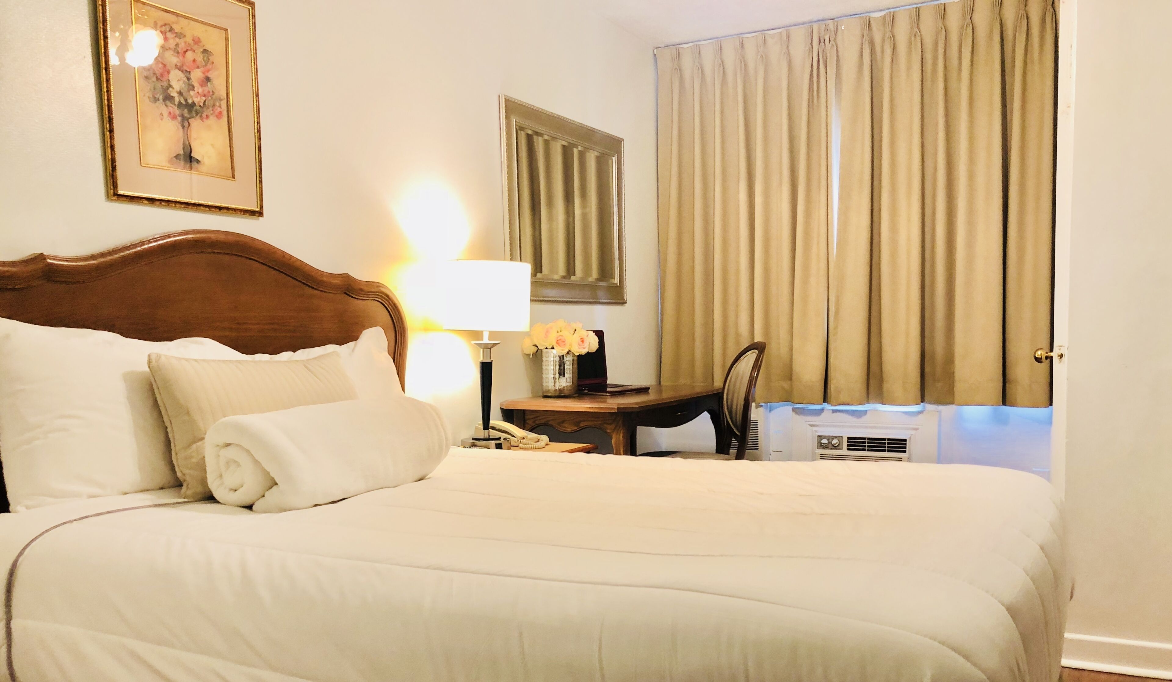 Individually decorated, desk, blackout curtains, iron/ironing board