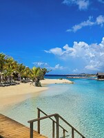 Private beach, white sand, sun loungers, beach towels