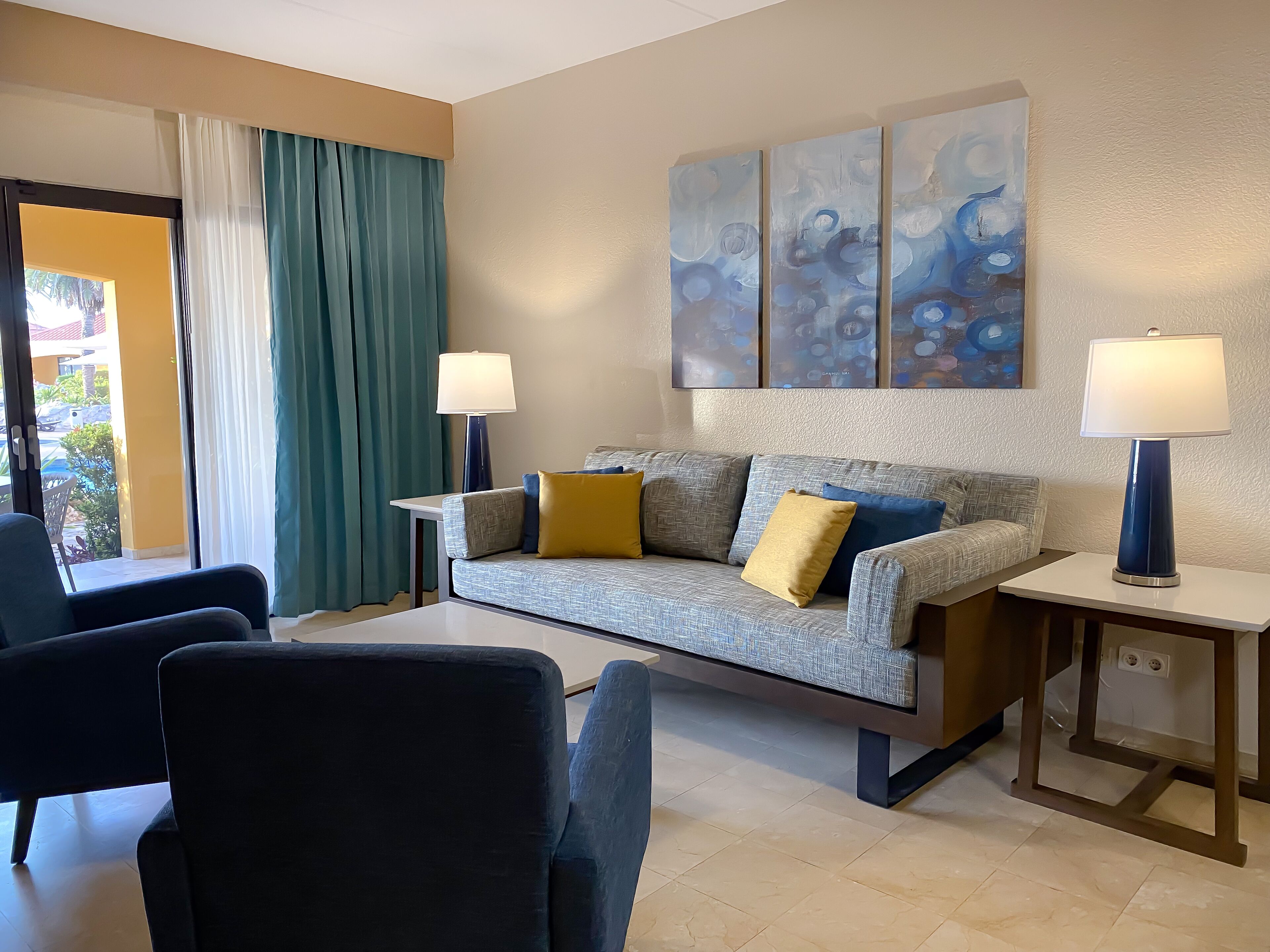suite, 1 bedroom, kitchen, ocean view | in-room safe, desk, blackout curtains, iron/ironing board