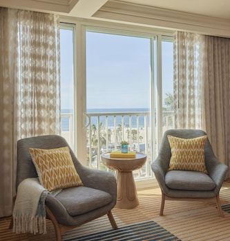 Hotel amenities such as safe, desk and work area at Viceroy Santa Monica