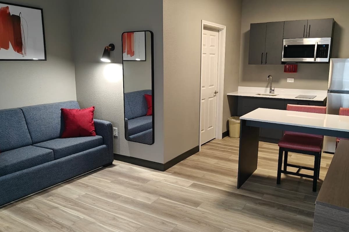 Suite, 1 Bedroom, Non Smoking | Desk, laptop workspace, iron/ironing board, free WiFi