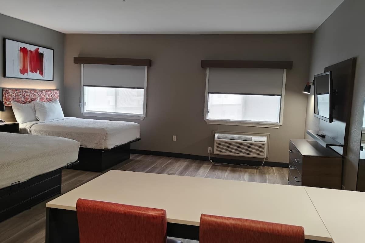 Deluxe Studio Suite, 2 Queen Beds, Non Smoking | Desk, laptop workspace, iron/ironing board, free WiFi