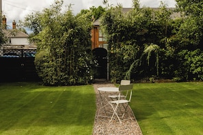 Habitación triple estándar | Vistas al jardín