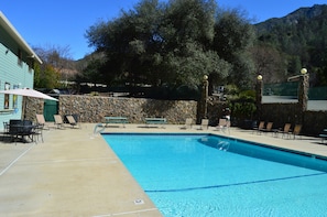 Indoor pool, seasonal outdoor pool, open 9 AM to 10 PM, pool umbrellas