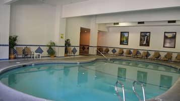 Indoor pool, seasonal outdoor pool, open 9 AM to 10 PM, pool umbrellas