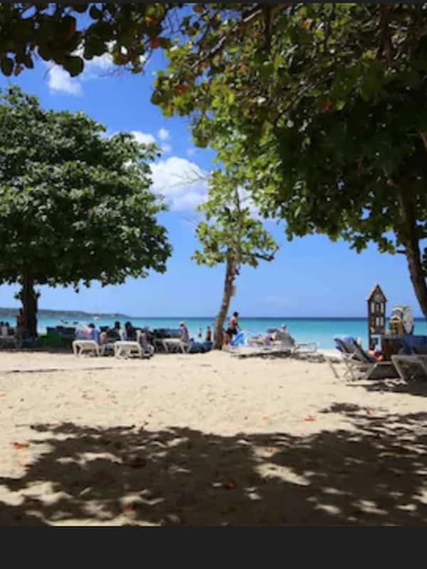 On the beach, sun loungers, beach towels, beach massages