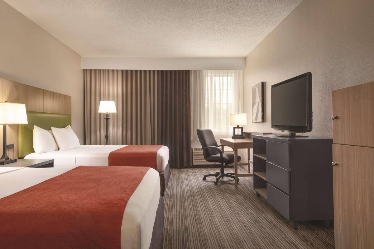 Premium bedding, down comforters, pillowtop beds, desk
