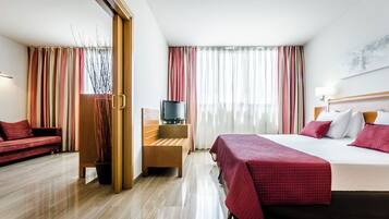 Suite, 1 King Bed (Single Use) | Minibar, in-room safe, desk, blackout drapes