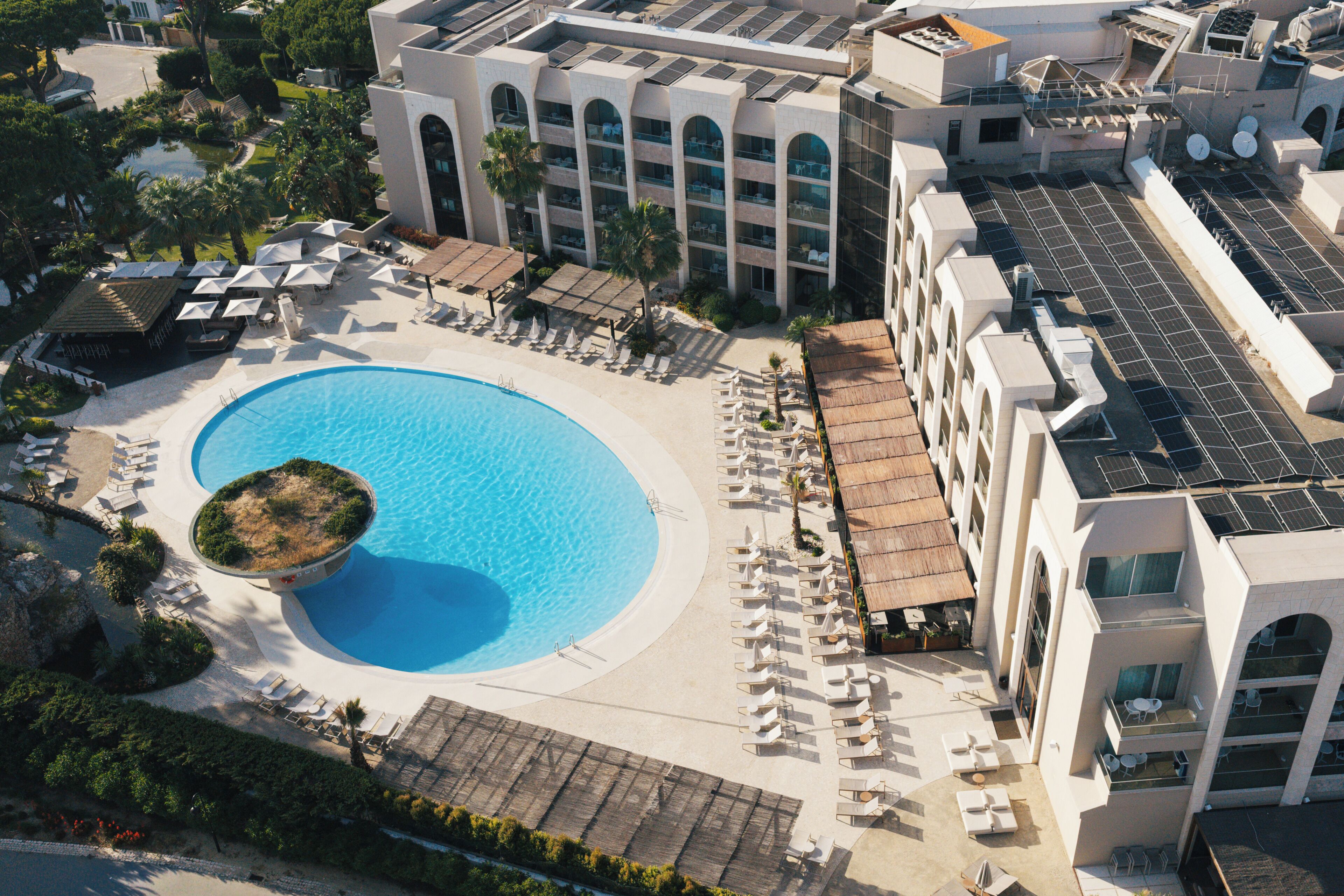 Indoor pool, outdoor pool, open 10:00 AM to 7:00 PM, pool umbrellas