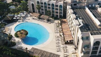 Indoor pool, outdoor pool, open 10:00 AM to 7:00 PM, pool umbrellas