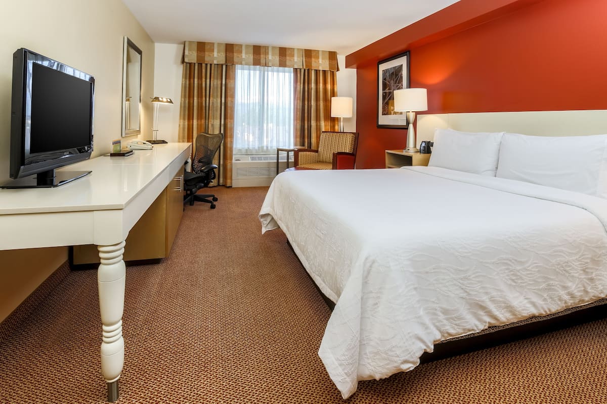 one king bed, with jetted tub | premium bedding, in-room safe, individually furnished, desk