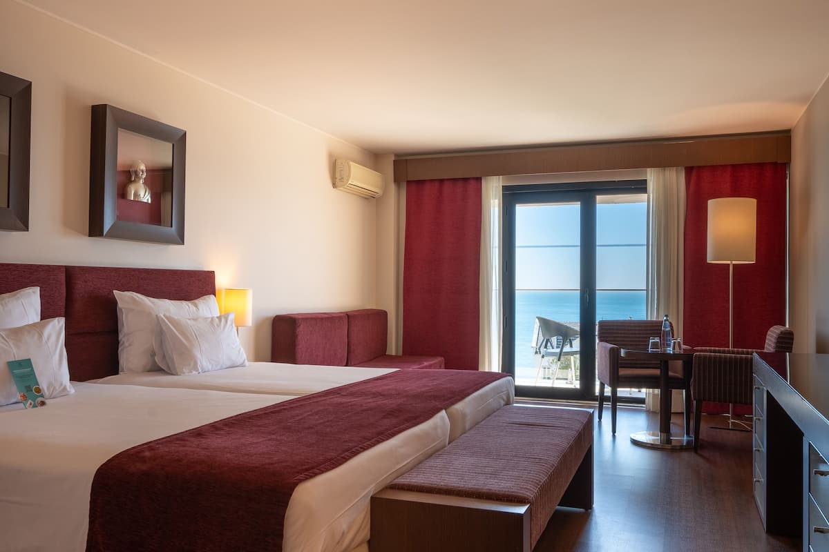 twin room, sea view (with extra bed, 3 adults) | 1 bedroom, minibar, in-room safe, desk