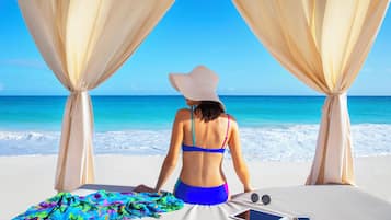 On the beach, scuba diving, beach volleyball, 2 beach bars