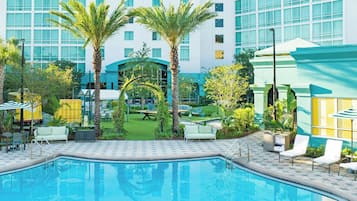 Outdoor pool, open 7:00 AM to 11:00 PM, pool umbrellas, sun loungers