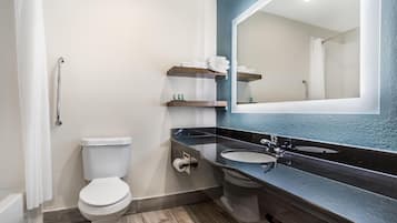 Suite, 1 King Bed, Non Smoking (with Sofabed) | Bathroom | Combined shower/tub, free toiletries, hair dryer, towels