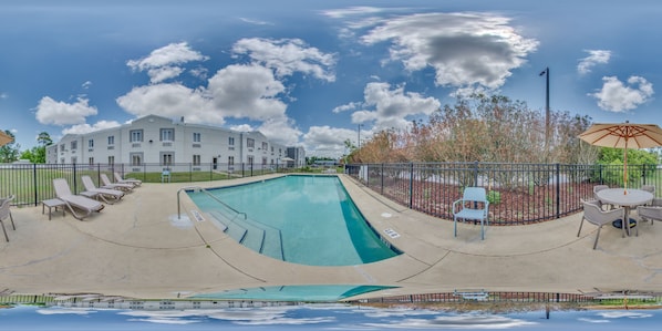 Seasonal outdoor pool, pool loungers