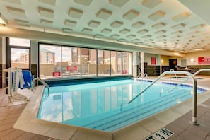 Indoor pool, seasonal outdoor pool, open 9 AM to 10 PM, pool umbrellas