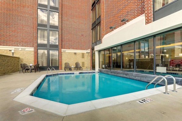 Indoor pool, seasonal outdoor pool, open 9 AM to 10 PM, pool umbrellas