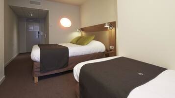 Premium bedding, desk, laptop workspace, blackout curtains