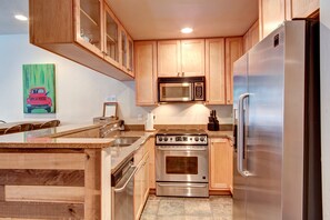 Condo, 1 Bedroom | Private kitchen | Full-size fridge, microwave, stovetop, dishwasher