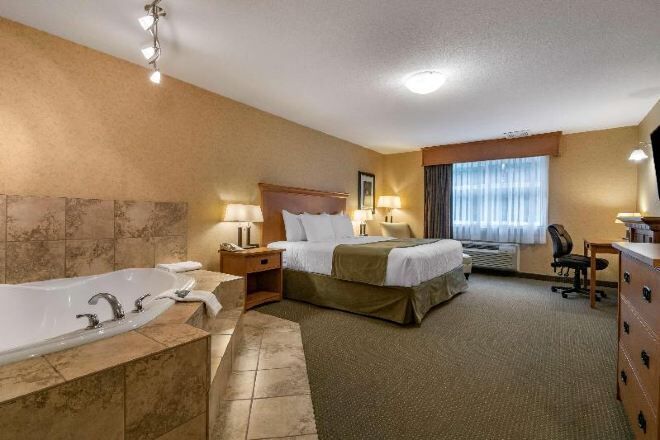 Pillowtop beds, desk, blackout drapes, iron/ironing board