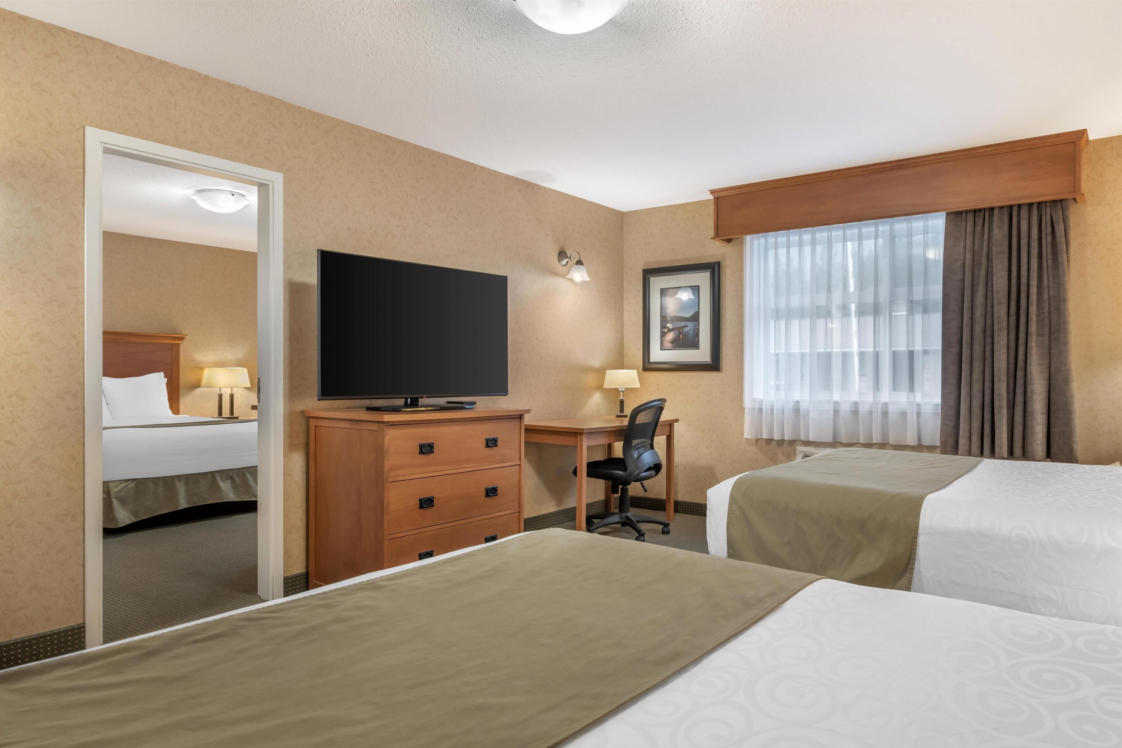 Family Suite, Multiple Beds, Non Smoking, Refrigerator & Microwave | Pillowtop beds, desk, blackout drapes, iron/ironing board