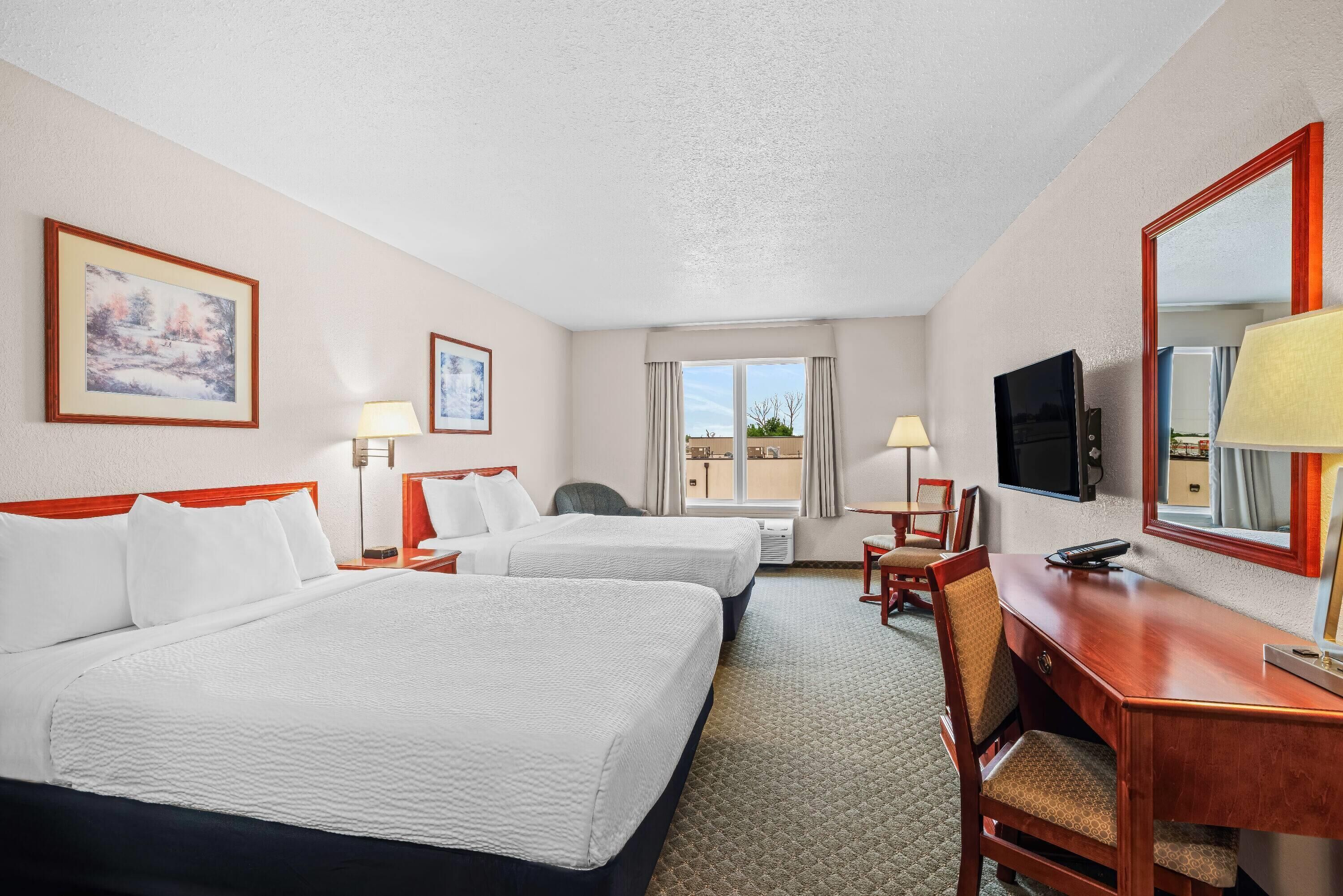 room, 2 queen beds, non smoking | desk, iron/ironing board, free wifi, bed sheets