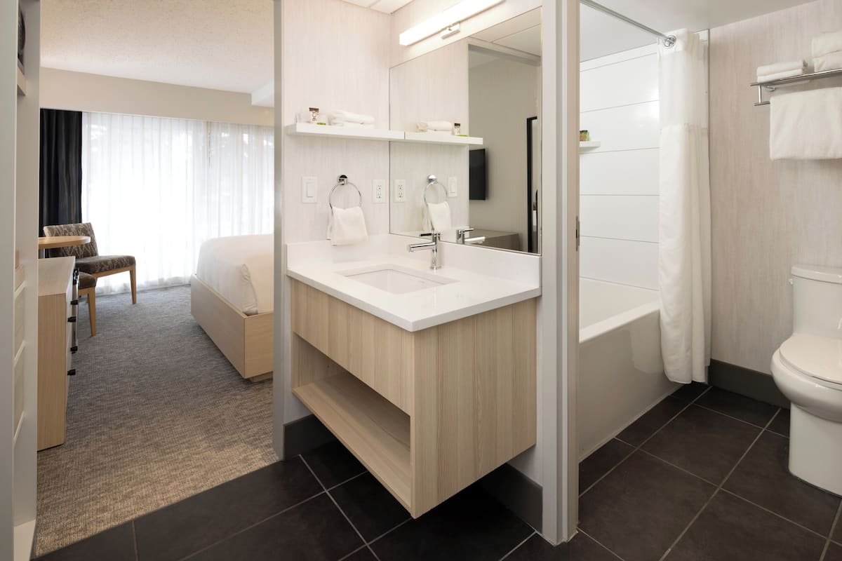 superior room (1 queen bed with bath) | in-room safe, iron/ironing board, free wifi, bed sheets