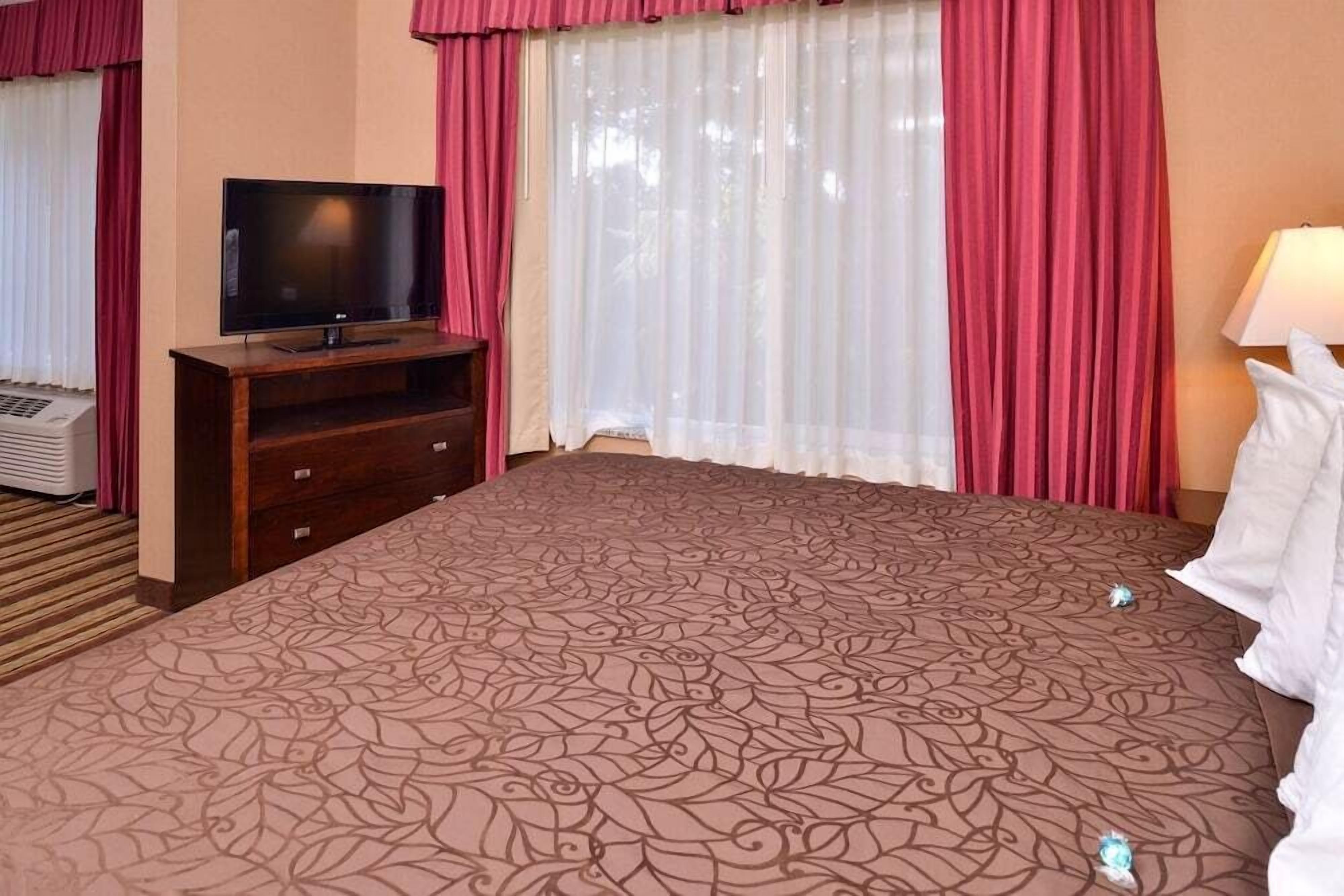 Pillowtop beds, blackout drapes, iron/ironing board, rollaway beds