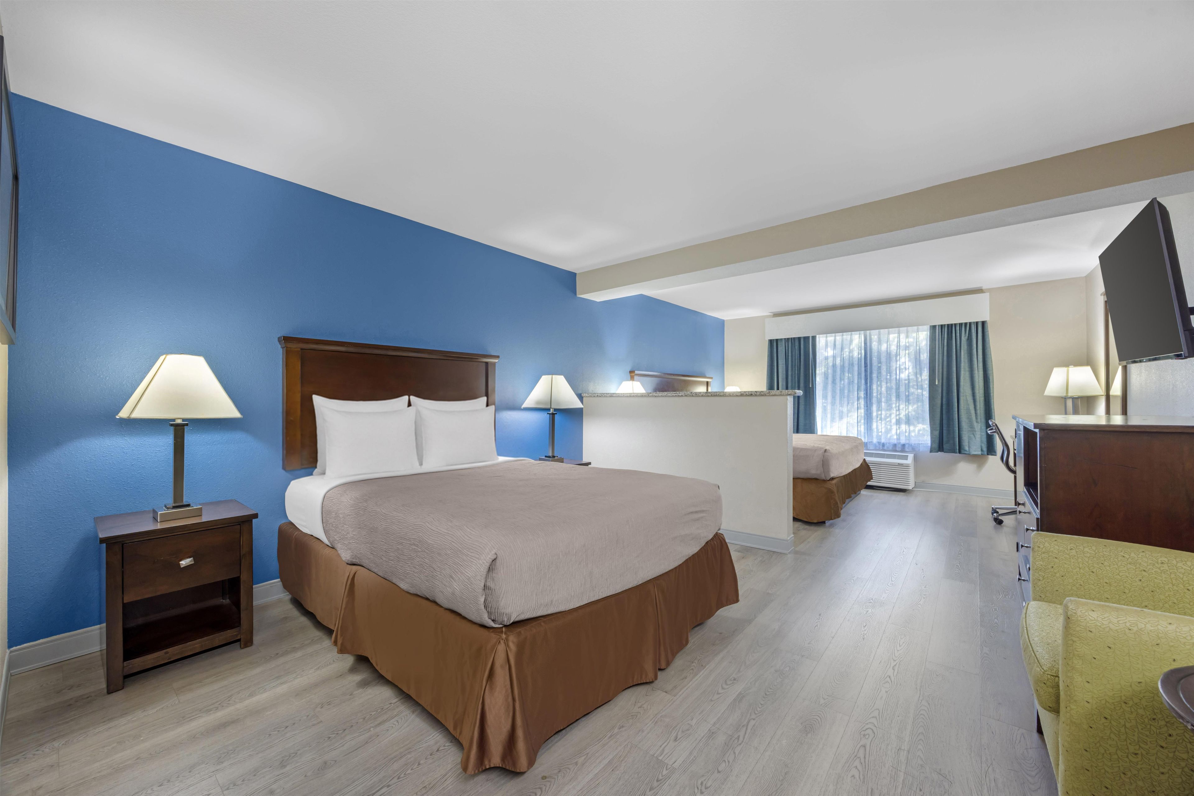 Suite, Multiple Beds, Non Smoking, Refrigerator & Microwave | Pillowtop beds, blackout drapes, iron/ironing board