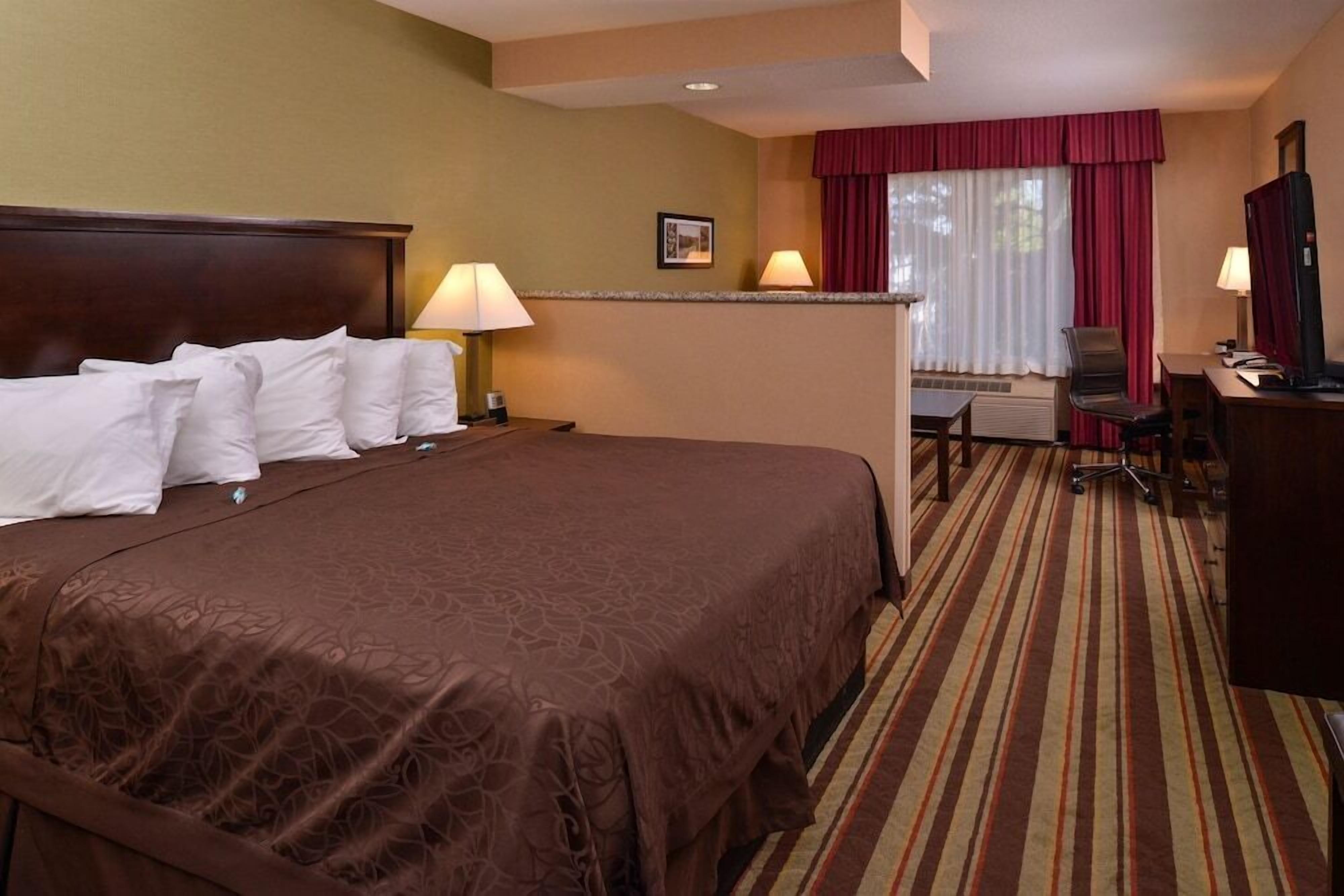 Pillowtop beds, blackout drapes, iron/ironing board, rollaway beds