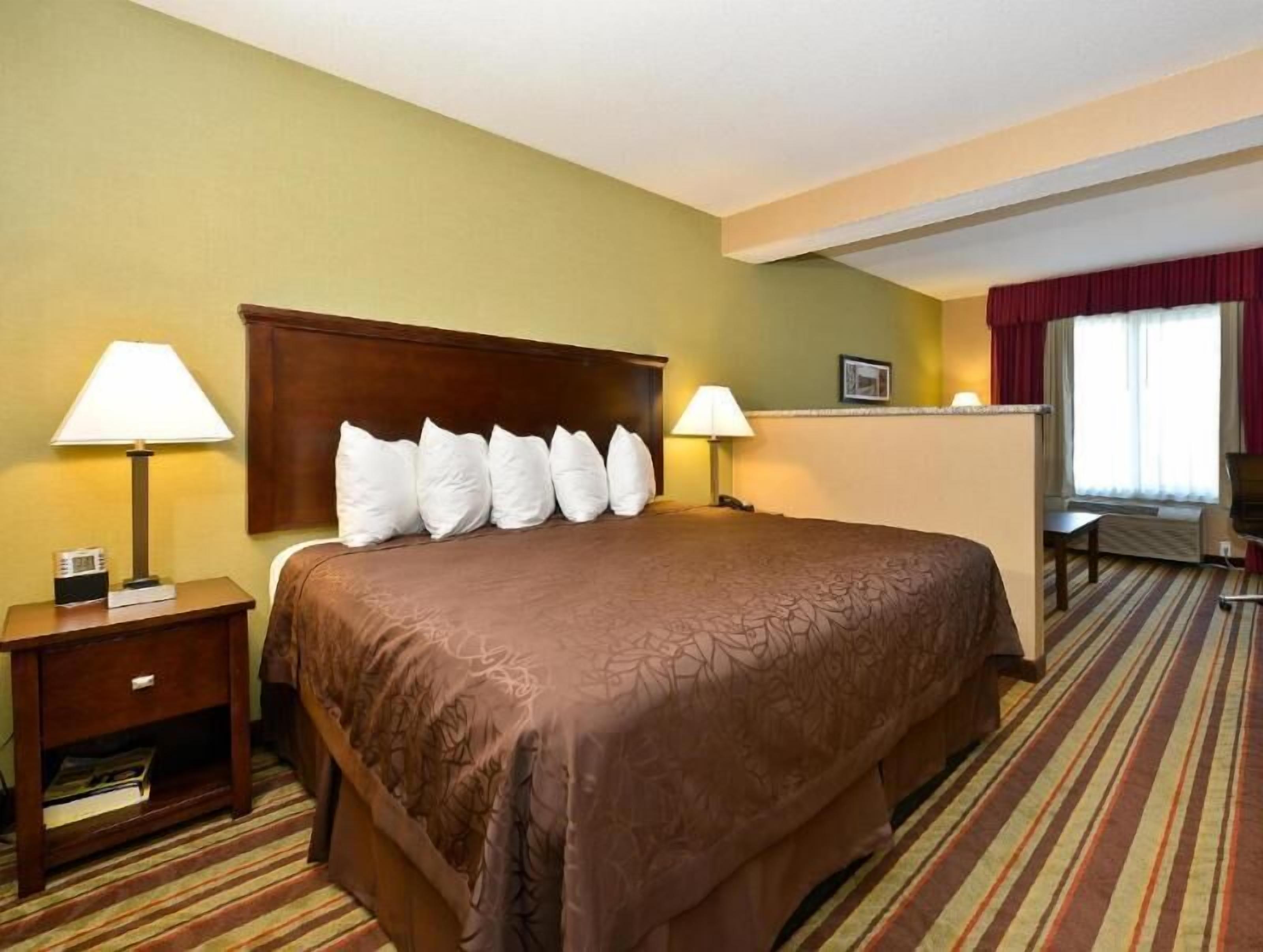 Pillowtop beds, blackout drapes, iron/ironing board, rollaway beds