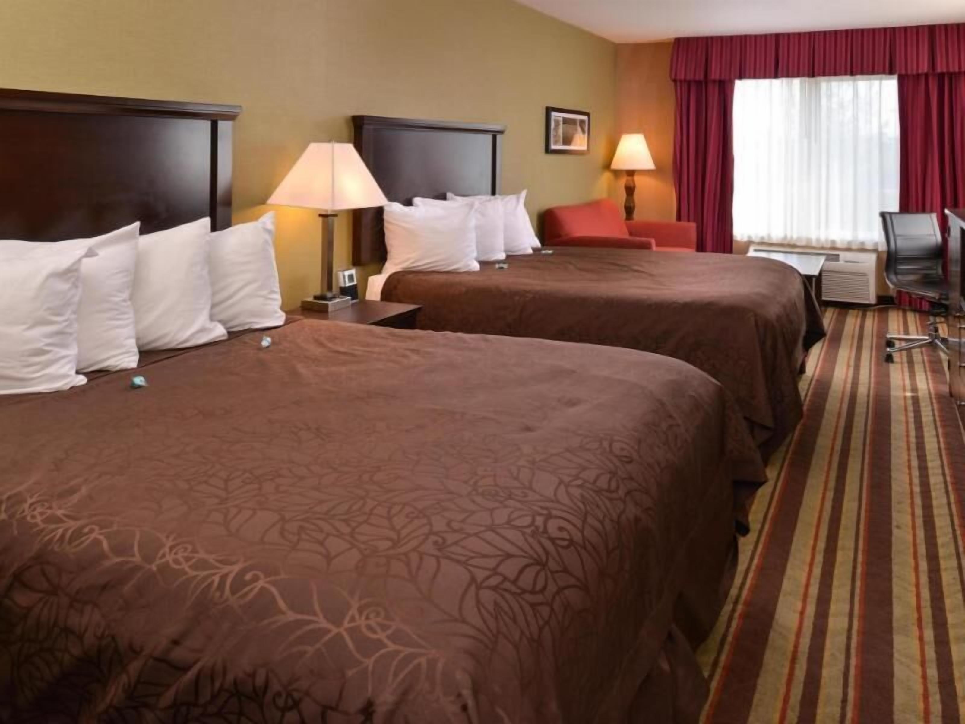 Pillowtop beds, blackout drapes, iron/ironing board, rollaway beds