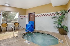 A hot tub area with a pool table, chairs, and a potted plant. - Best Western Wilsonville Inn & Suites (Wilsonville)
