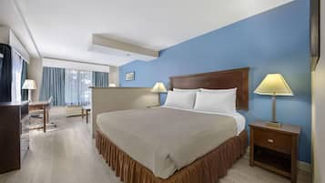 Suite, 1 King Bed, Non Smoking, Refrigerator & Microwave | Pillow-top beds, blackout curtains, iron/ironing board, rollaway beds