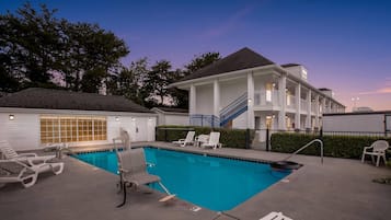 Seasonal outdoor pool, open 10:00 AM to 10:00 PM, sun loungers