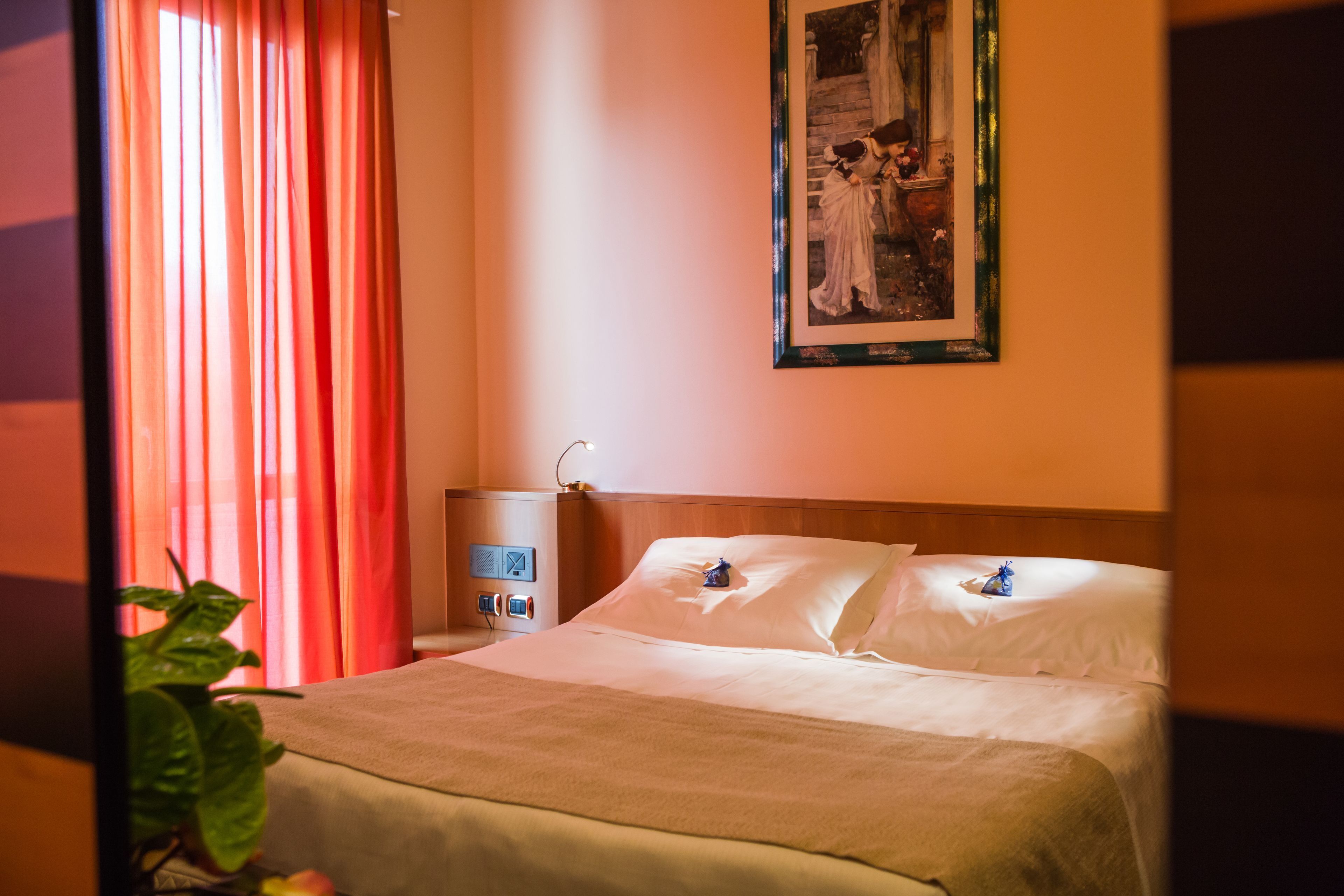 Hypo-allergenic bedding, minibar, in-room safe, desk