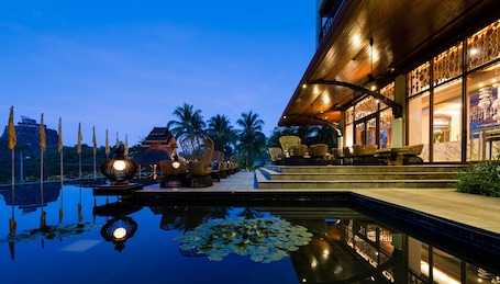 Outdoor pool, open 7:00 AM to 10:00 PM, pool umbrellas, sun loungers