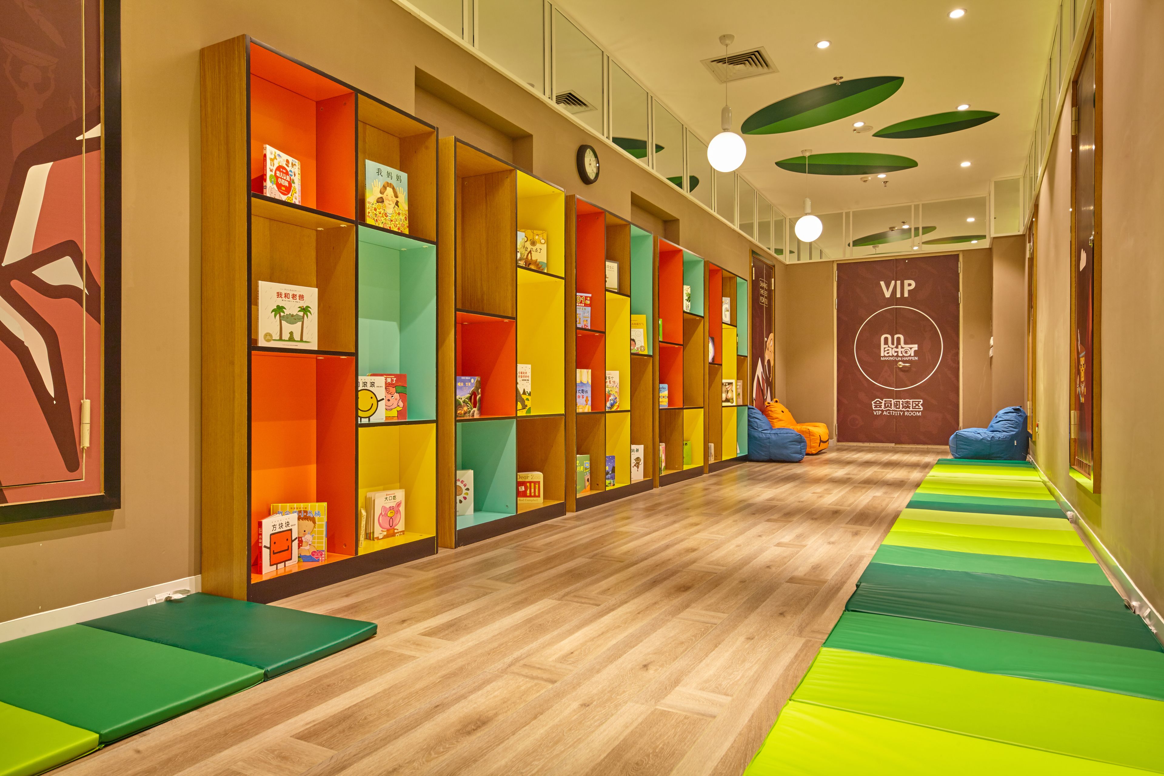 A brightly lit children's play area with colorful shelves and a VIP activity room sign.