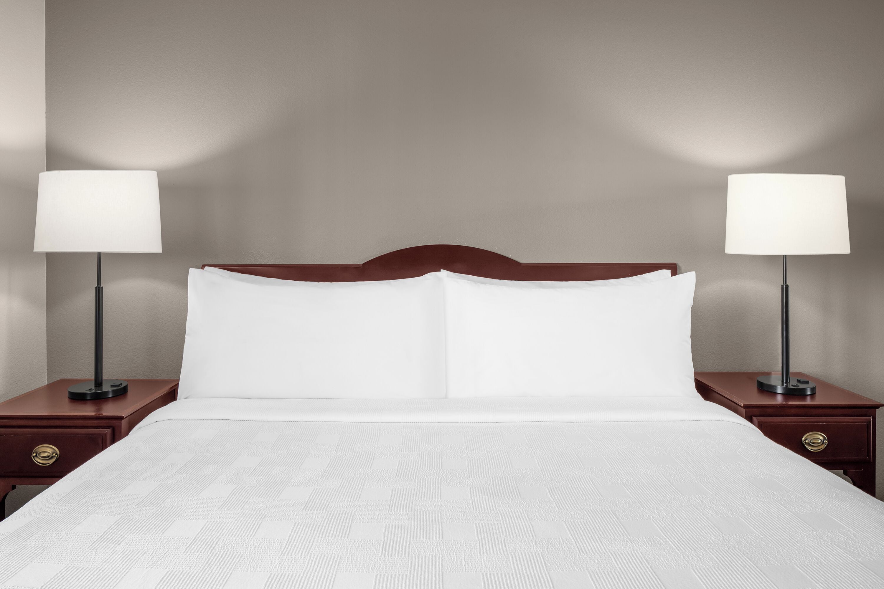 Hypo-allergenic bedding, desk, laptop workspace, blackout curtains