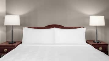 Hypo-allergenic bedding, desk, laptop workspace, blackout curtains