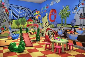 A colorful children's playroom with various toys and play structures. - Somerset Park Suanplu Bangkok (Bangkok)