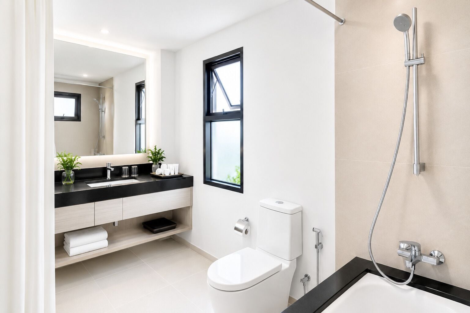 A modern bathroom with a toilet, sink, and shower.