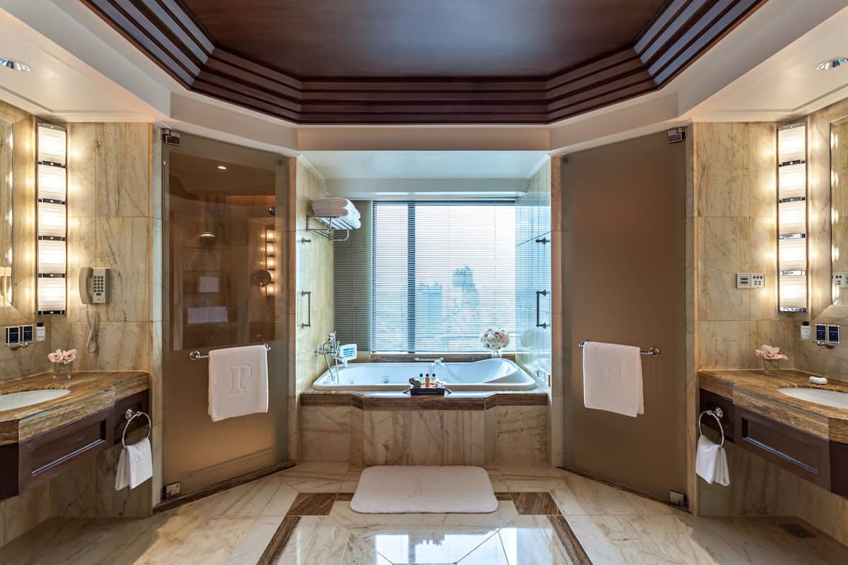 separate bathtub and shower, deep-soaking bathtub, designer toiletries