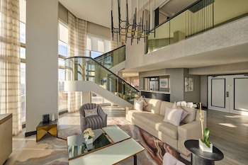 Presidential Studio Suite, Balcony, Oceanfront | 1 bedroom, premium bedding, in-room safe, desk at Loews Miami Beach Hotel – South Beach