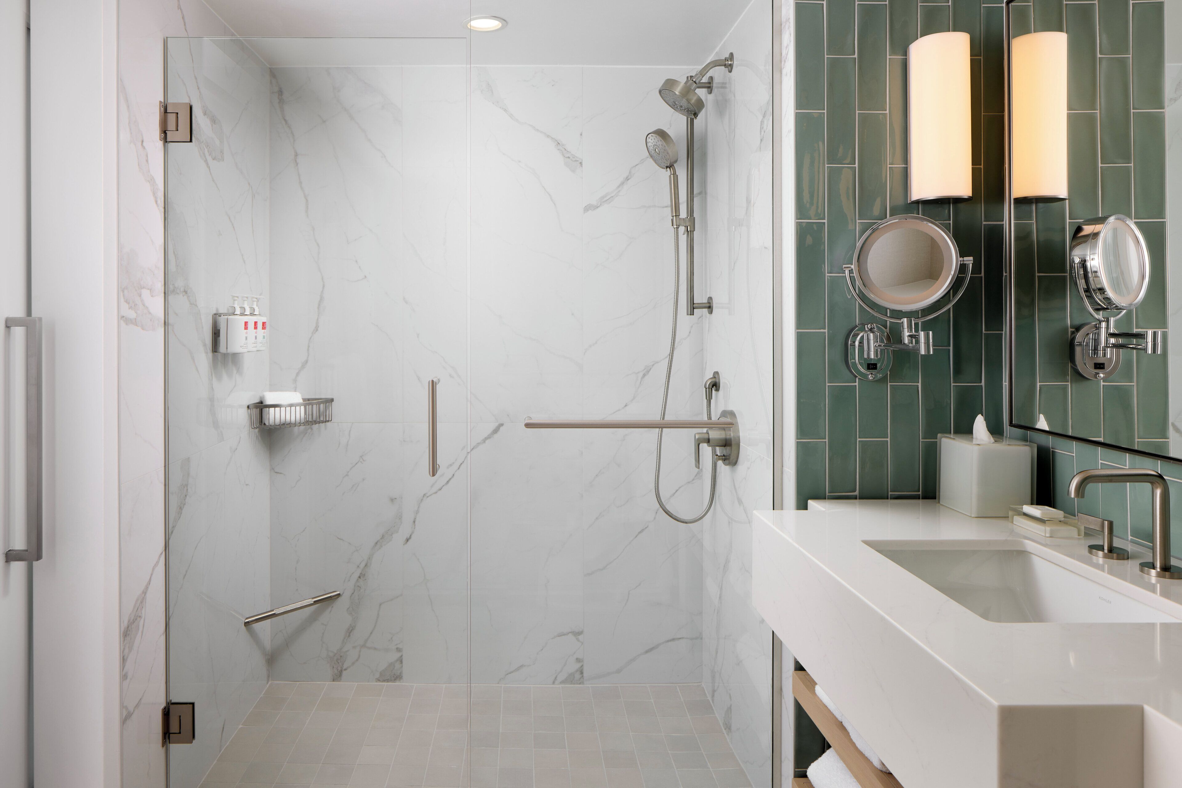 Designer toiletries, hair dryer, bathrobes, slippers