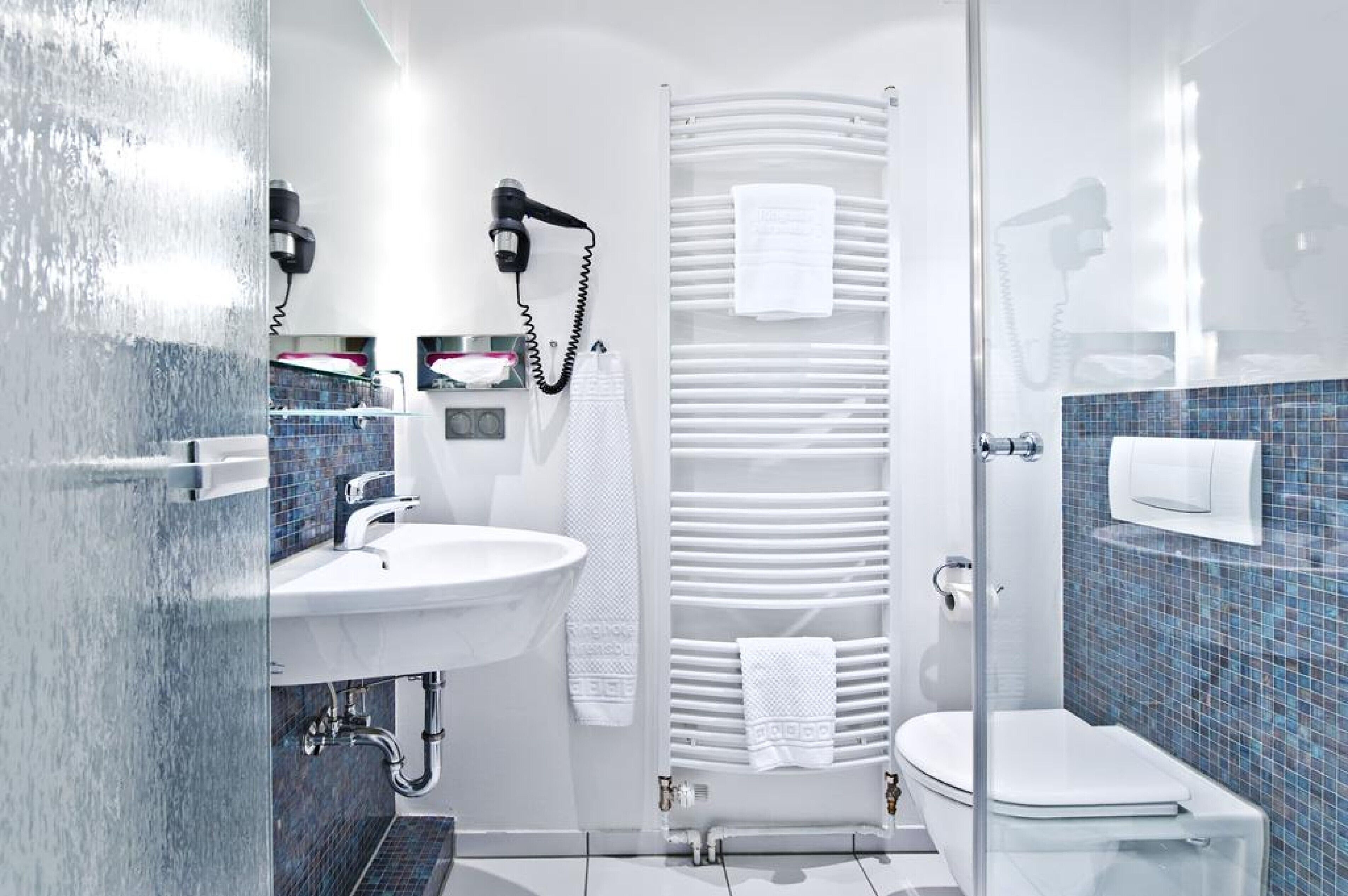 shower, free toiletries, hair dryer, towels