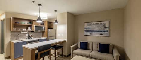 Desk, laptop workspace, blackout drapes, iron/ironing board