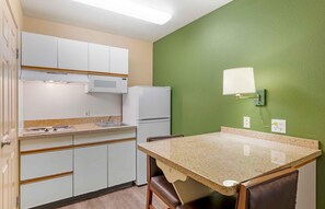 Fridge, microwave, stovetop, coffee/tea maker