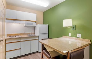 Fridge, microwave, stovetop, coffee/tea maker